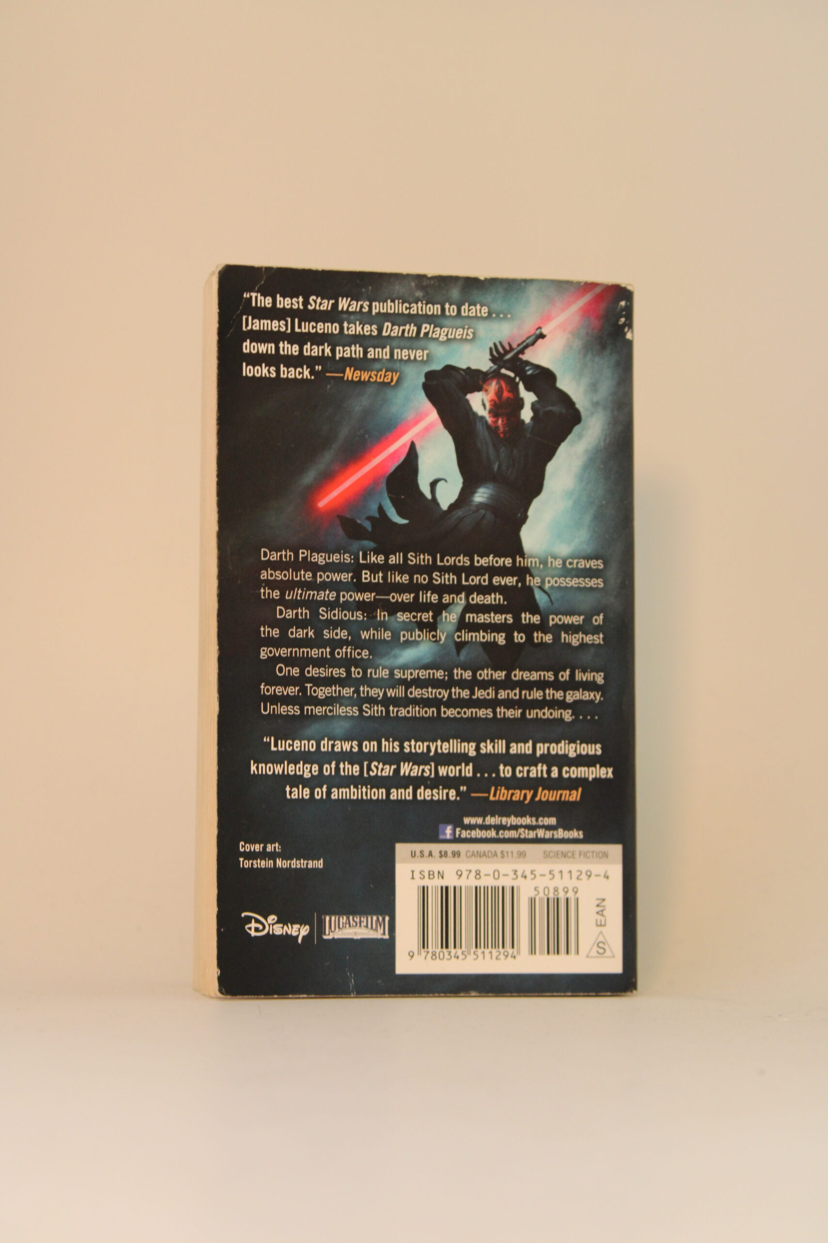 IMG_0615 A photo of Star Wars: Darth Plageius showing the back cover with a Darth Maul action stance and a book description.