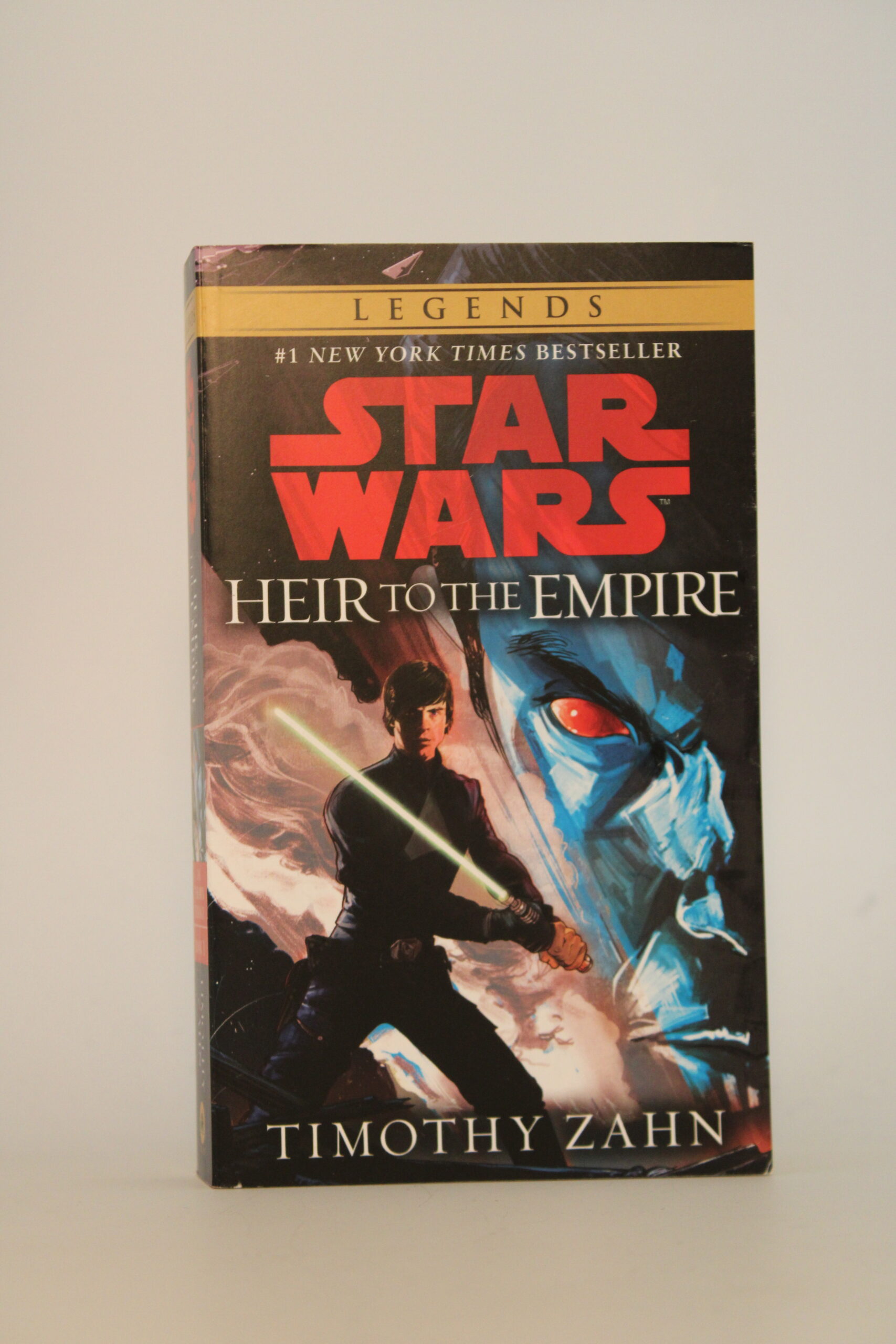 IMG_0636 An image of Star Wars: Heir to the Empire with its front cover displaying Luke Skywalker standing in front of a giant Admiral Thrawn head with an angry face.