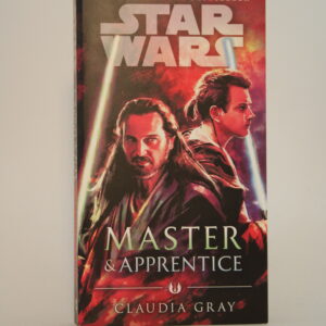 An image of Star Wars: Master and Apprentice with its front cover displaying a young Obi-Wan Kenobi standing by Qui-Gon Jin's side with each of them having lightsabers.